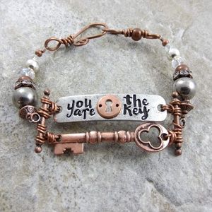 Handmade copper and silver bracelet.